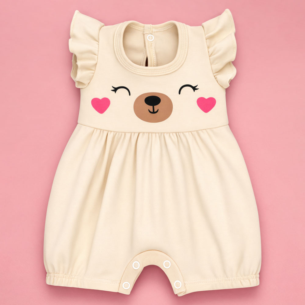 Macacão Curto Minimalista Babado Rostinho Feliz Bege Bebê Menina