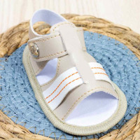 SANDÁLIA COM VELCRO E LISTRA PARA BEBÊ MENINO BEGE