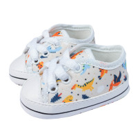 TÊNIS COM CADARÇO PARA BEBÊ ESTAMPADINHO DINOSSAURO CREME